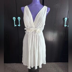 White Sleeveless Dress with Floral Detail